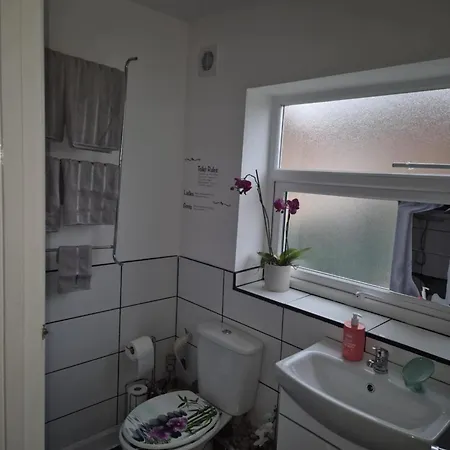 Gæstehus We Rise By Lifting Others *